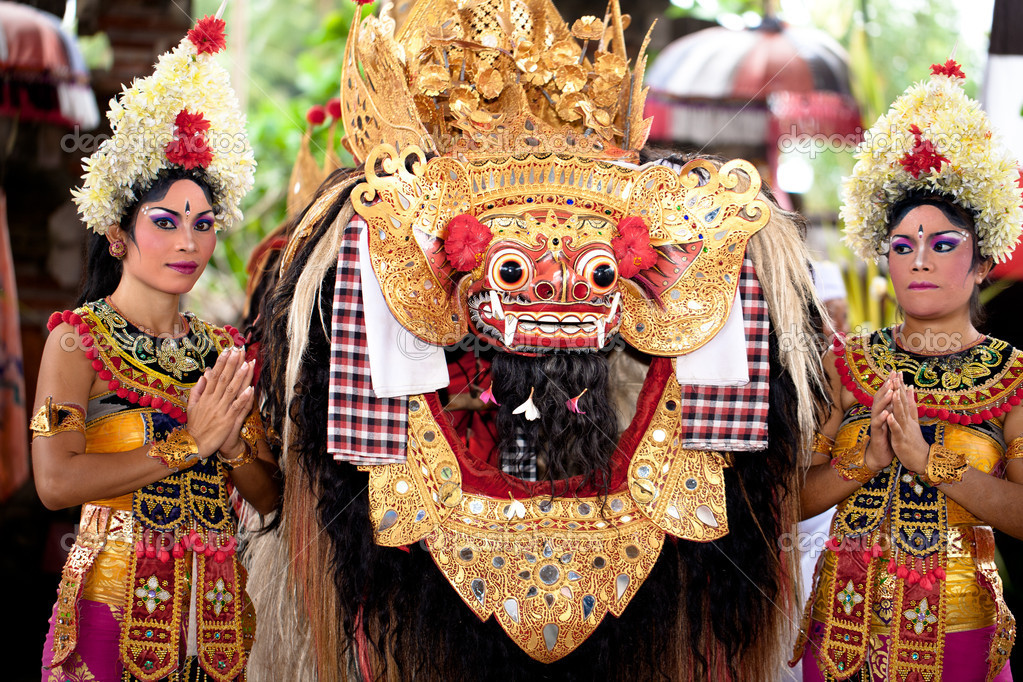 BATUBULAN, BALI, INDONESIA- JUNE 23: Unidentified women dance for turist at the weekly Barong Dance, the traditional balinese perfomance on June 23, 2011 in Batubulan, Bali, Indonesia.